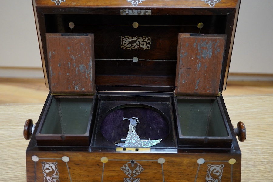 A Victorian rosewood and mother-of-pearl inlaid sarcophagus tea caddy, 39cm wide. Condition - fair